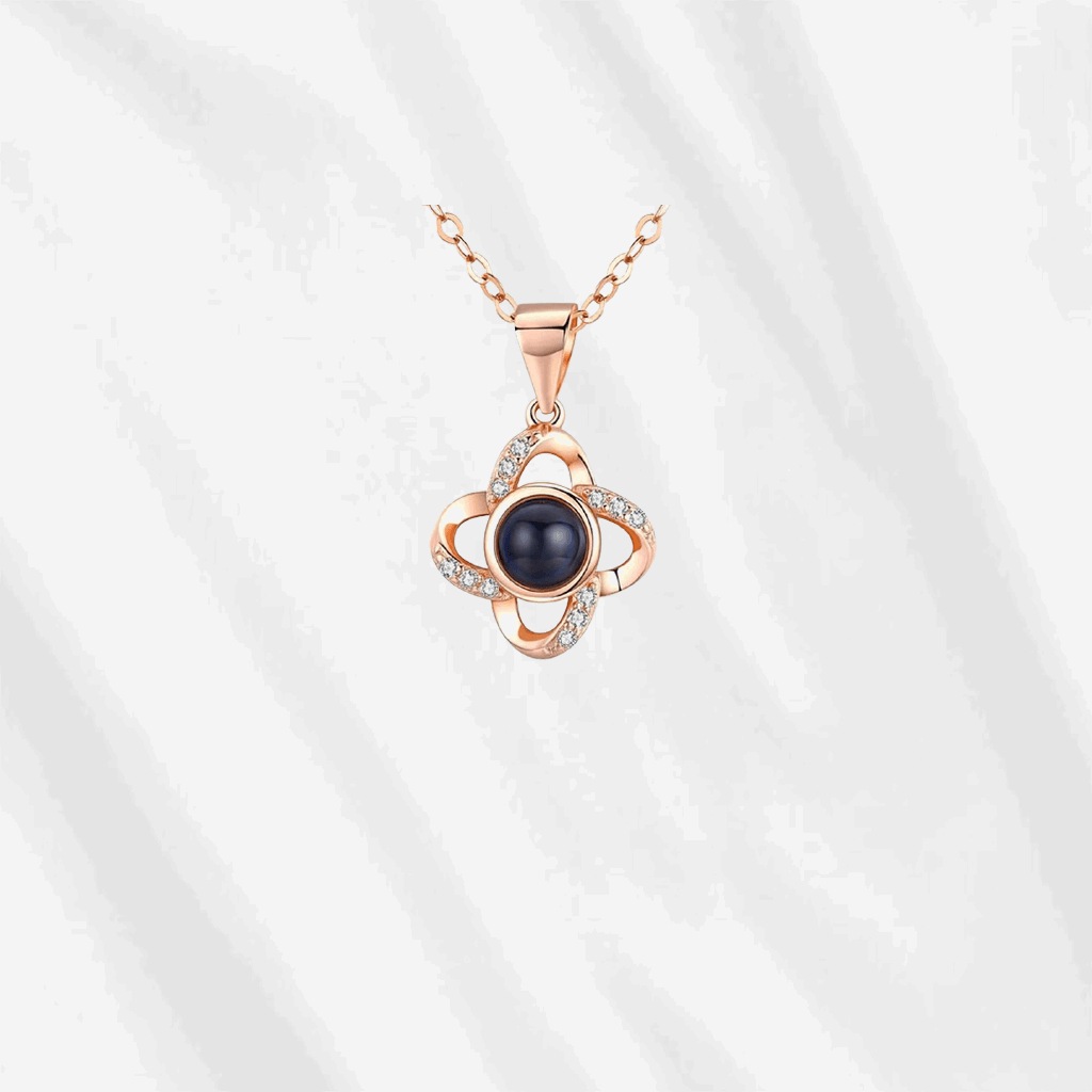 A clover necklace deserves a place in your jewelry collection. Customodish clover projection necklace comes in silver and rose gold colors. 